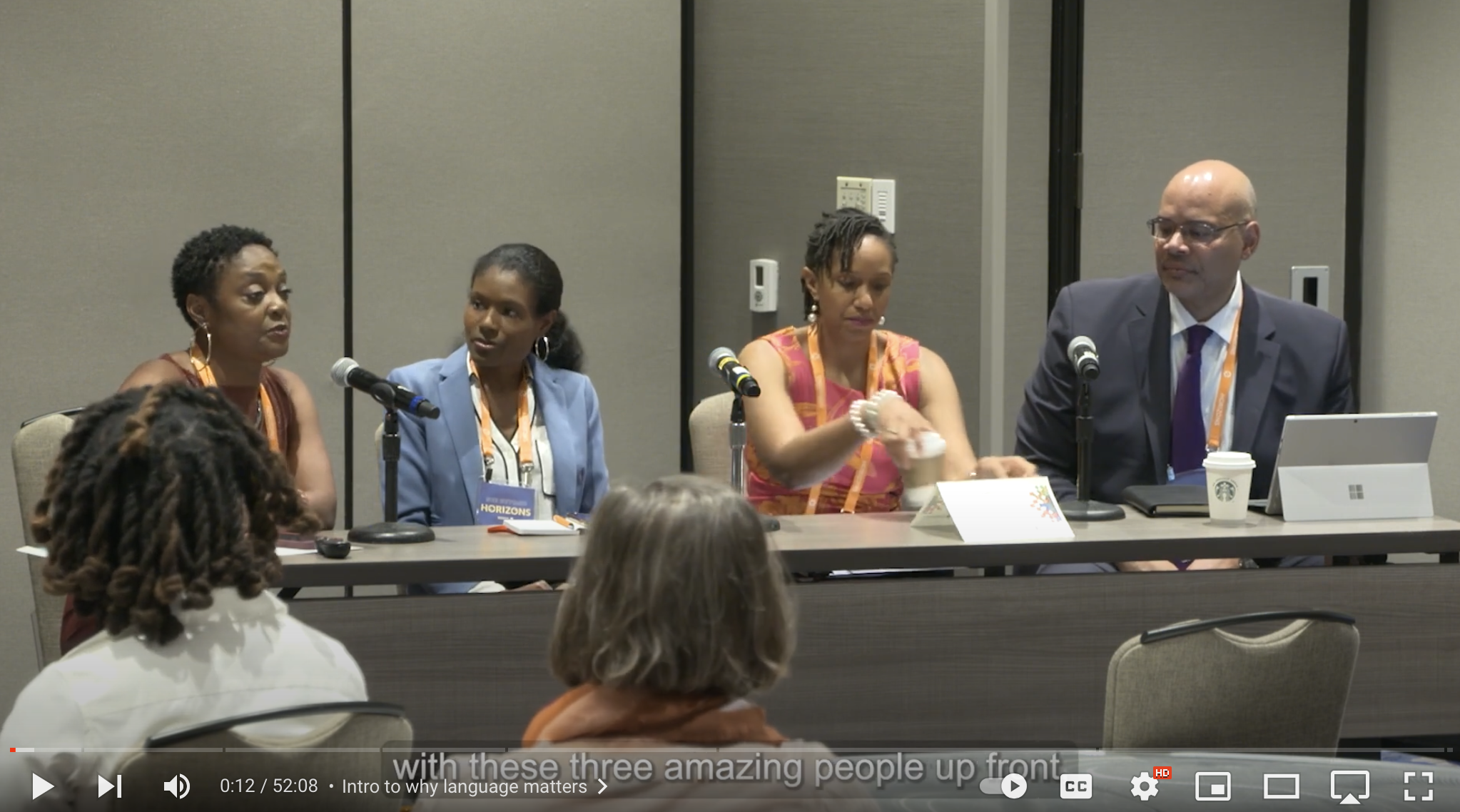 Panel participants onstage at Horizons