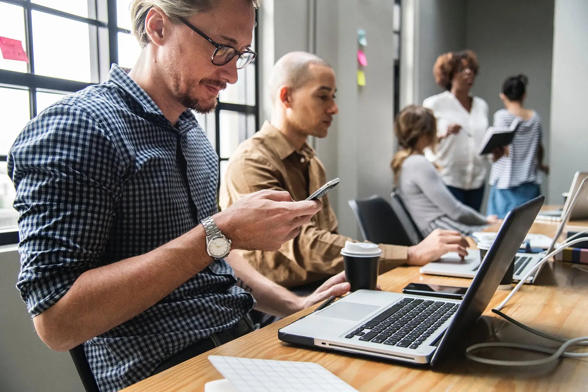 Adults working on computer